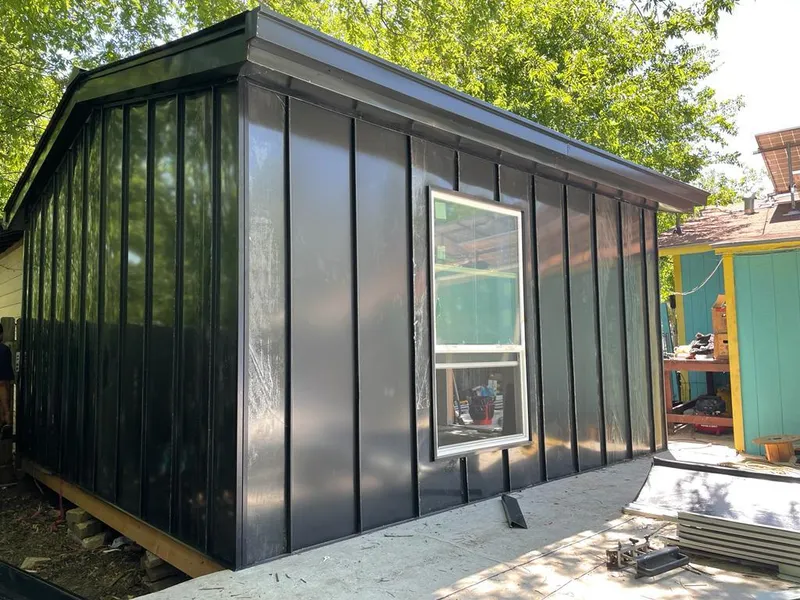 Black standing seam metal wall panels for Roof Inspection in Suncrest