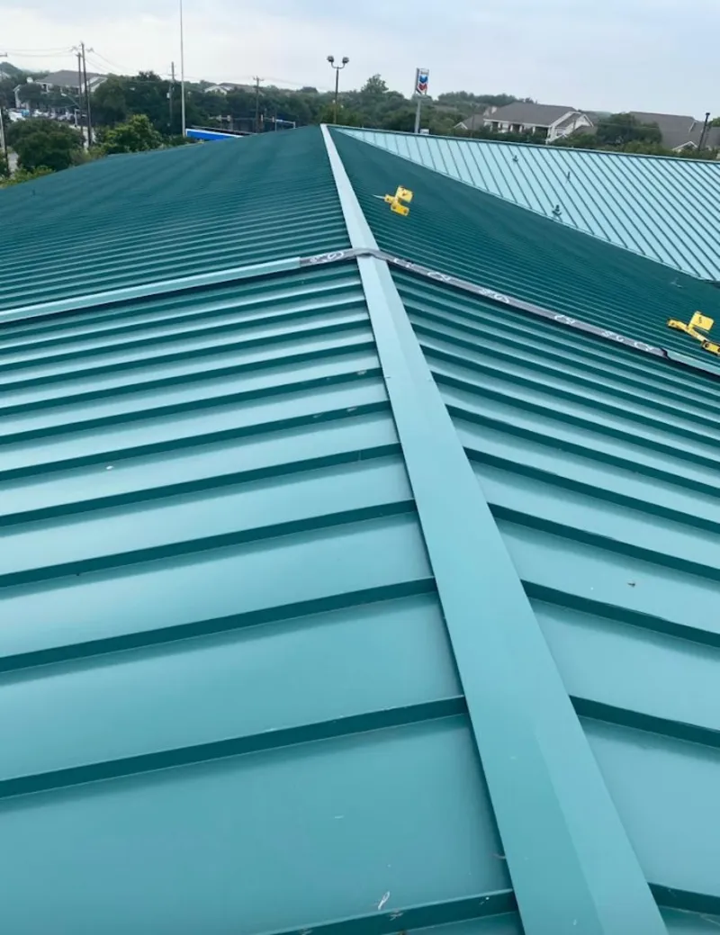 Green commercial metal roof ridge and valley for Metal Roof Repair in Suncrest